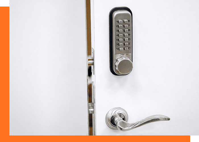 Digital door lock with silver handle. Door safety system, code keypad closeup. Open door with control system using digital locking and password to acces