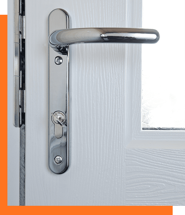 Modern chrome high security door lock on a composite door